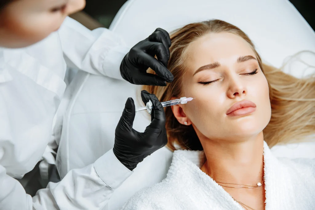 Woman receiving Sculptra face injection treatment | UNA Aesthetics | Medical Spa in Edgewater, New Jersey