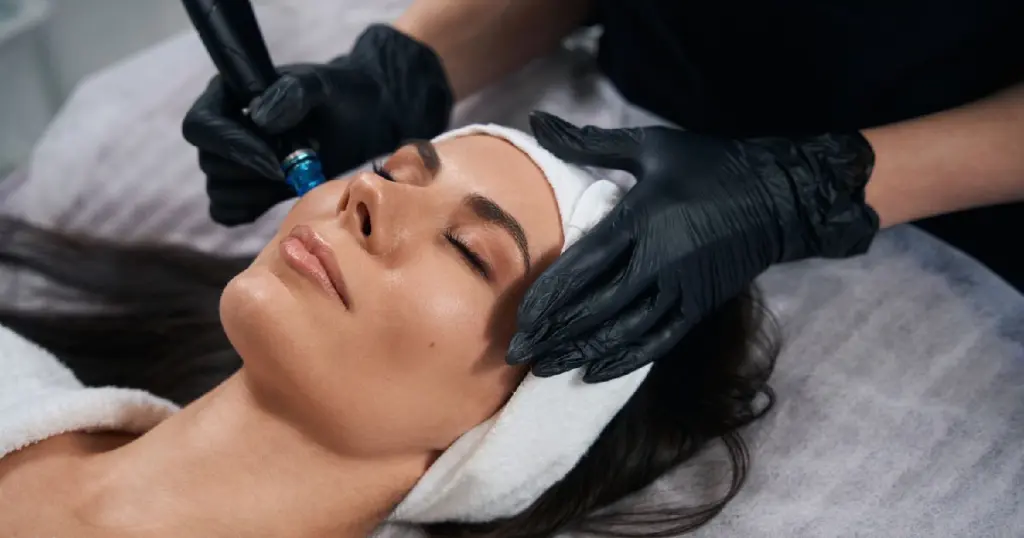 Current image: Patient receiving Microneedling treatment in Edgewater, NJ, improving skin texture and reducing fine lines and wrinkles